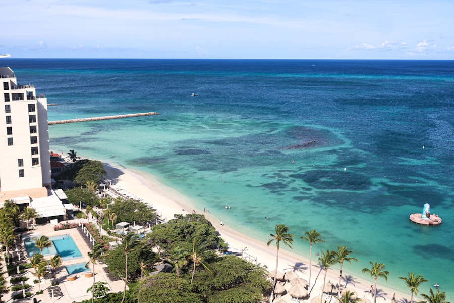 Aerial view of a turquoise-water resort beach